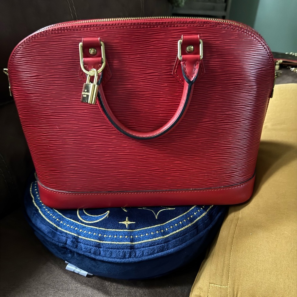 Louis Vuitton Alma in rich Eppi leather.